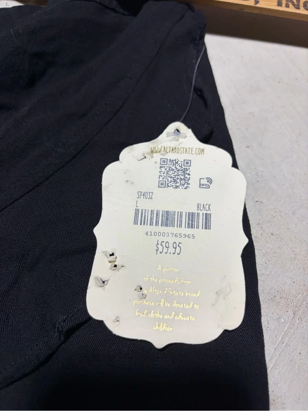 Altar’d state NWT Black Ruffled Skort large MSRP$60